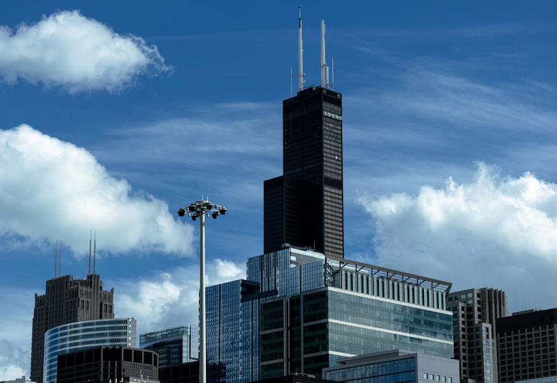 a city with tall buildings and a street light