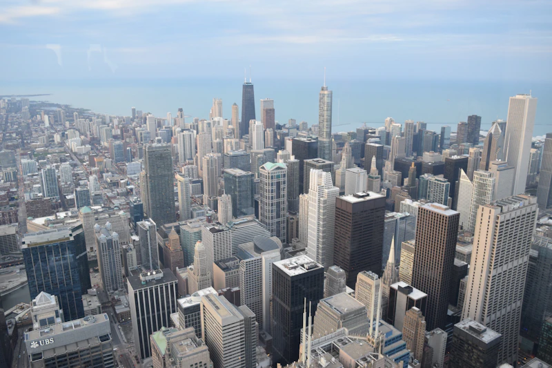 a view of a large city from the top of a building