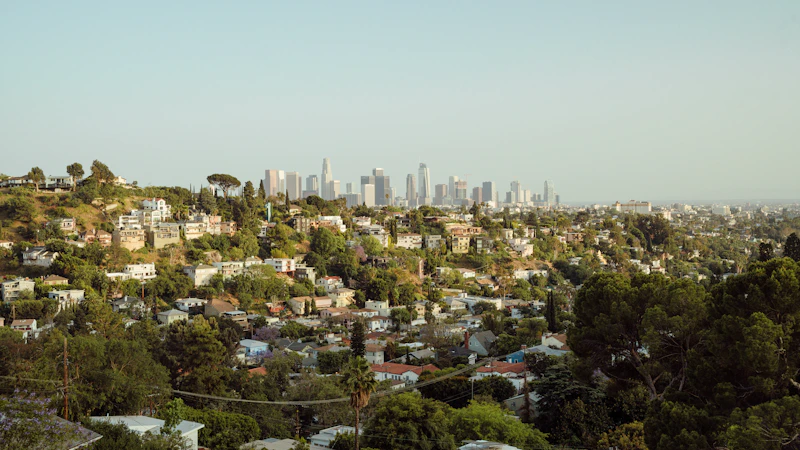 a view of a city from the top of a hill