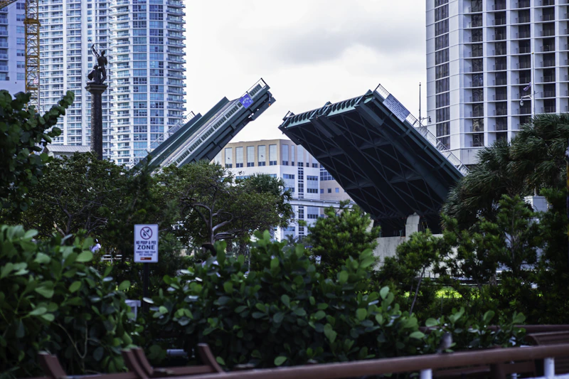 The drawbridge is raised between two buildings.
