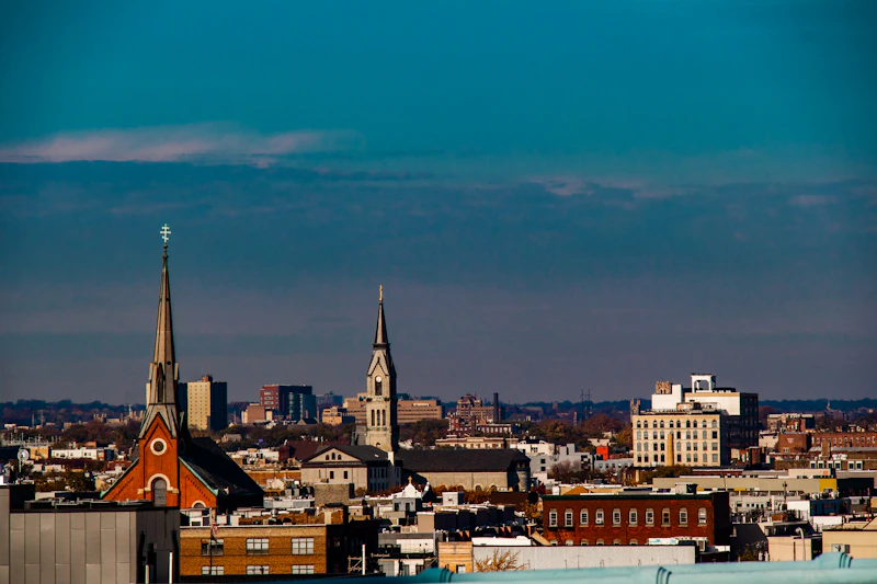 a view of a city with a church steeple